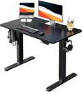 HUANUO Electric Standing Desk, Whole Piece Desktop, Adjustable Height Computer Desk, 4 Height Memory Settings, Sit Stand Up Desk for Home Office, 40" x 24", Black