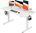HUANUO Electric Standing Desk, Whole Piece Desktop, Adjustable Height Computer Desk, 4 Height Memory Settings, Sit Stand Up Desk for Home Office, 55" x 27", White