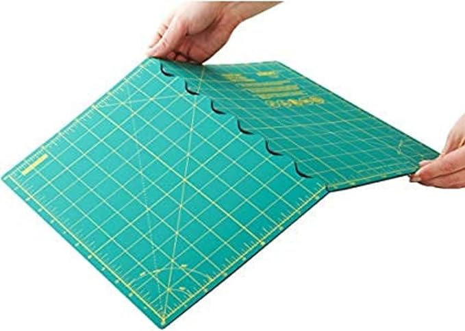 OLFA 12" x 17" Folding Cutting Mat (FCM-12x17) - Self Healing 12x17 Inch Foldable Rotary Mat with Grid for Quilting, Sewing, Fabric, & Crafts, Use with Rotary Cutters & Fixed Blade Knives (Green)