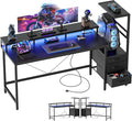 Mericonia Gaming Desk with Power Outlets & LED Lights, Reversible Computer Desk with PC Case Stand, Fabric Drawers, Modern Office Desk with Shelves, Monitor Stand