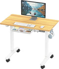SHW 40-Inch Mobile Electric Height Adjustable Sit to Stand Desk with Drawer, Hanging Hooks and Cable Management, Oak