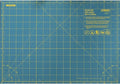 OLFA 12" x 17" Folding Cutting Mat (FCM-12x17) - Self Healing 12x17 Inch Foldable Rotary Mat with Grid for Quilting, Sewing, Fabric, & Crafts, Use with Rotary Cutters & Fixed Blade Knives (Green)