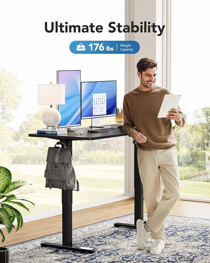 HUANUO Electric Standing Desk, Whole Piece Desktop, Adjustable Height Computer Desk, 4 Height Memory Settings, Sit Stand Up Desk for Home Office, 48" x 30", Black