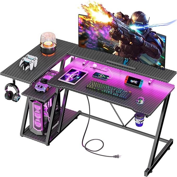 Korfile 47 Inch Gaming Desk with Power Outlet & LED Lights, Corner Computer Desk with 3 Tiers Storage Shelves, Home Office Desk with Monitor Stand for Small Space, Carbon Fiber Black