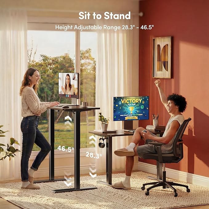 FEZIBO Standing Desk, 55×28 Inches Electric Height Adjustable, Sit Stand Up, Computer Office Desk with Splice Board, Black Frame/Black Walnut TOP