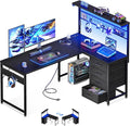 MOTPK 51” Large L Shaped Gaming Desk, Corner Computer Table with Shelf & Hutch, 4 Drawers, Reversible Study Desk with LED Light, Power Outlets & USB Ports, Home Office Table, Black