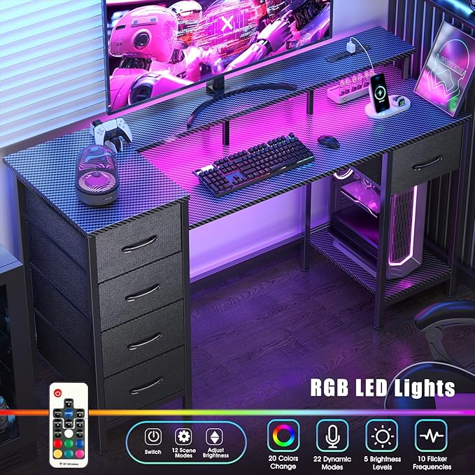 Korfile 55 Inch Gaming Desk with Power Outlets and LED Lights, Reversible Computer Desk with 5 Fabric Storage Drawers, Home Office Desk with Monitor Stand for Working Writing Study, Carbon Fiber Black