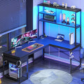 SEDETA L Shaped Gaming Desk, 51.2" Reversible Small Corner Desk with Drawer, Power Outlet & LED Lights, Computer Desk with Storage Shelves for Small Space, Black