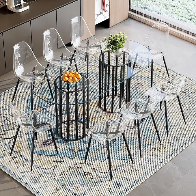 Table and chair set.71 inch oval tempered glass dining table,black double column light luxury style. Paired with 8 Transparent Plastic Chairs with Black Metal Legs. Accurate size, suitable for 8 peo