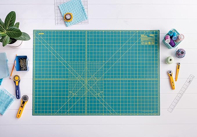 OLFA 24" x 36" Self Healing Rotary Cutting Mat (RM-MG) - Double Sided 24x36 Inch Cutting Mat with Grid for Quilting, Sewing, Fabric, & Crafts, Designed for Use with Rotary Cutters (Green)